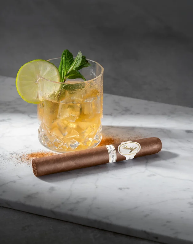 A Davidoff Chefs Edition 2025 cigar next to a glass of Virgin Moscow Mule.