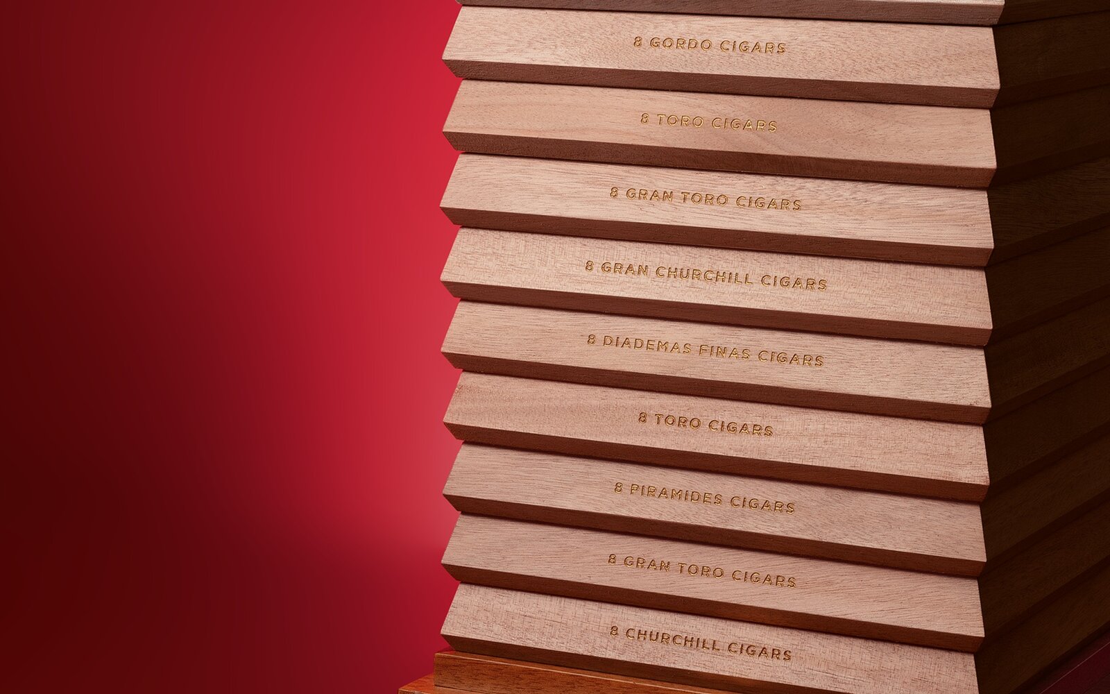 The Davidoff The Year of Collector’s Edition consisting of its stacked wooden trays and a striking red casing.