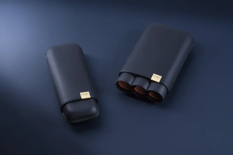 Iconic blue cigar cases in two sizes, for two or three cigars.