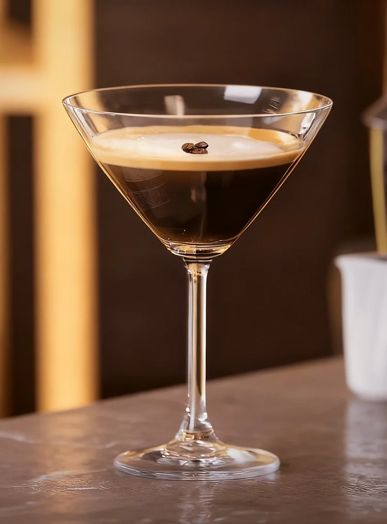 The Davidoff Winston Churchill Limited Edition 2025 leaning against an Espresso Martini.