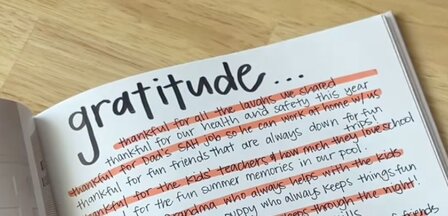 journal with gratitude written at the top