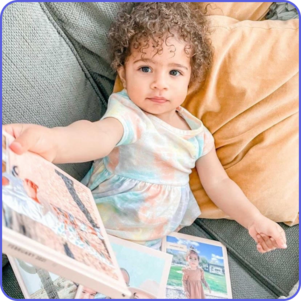 child holding chatbooks