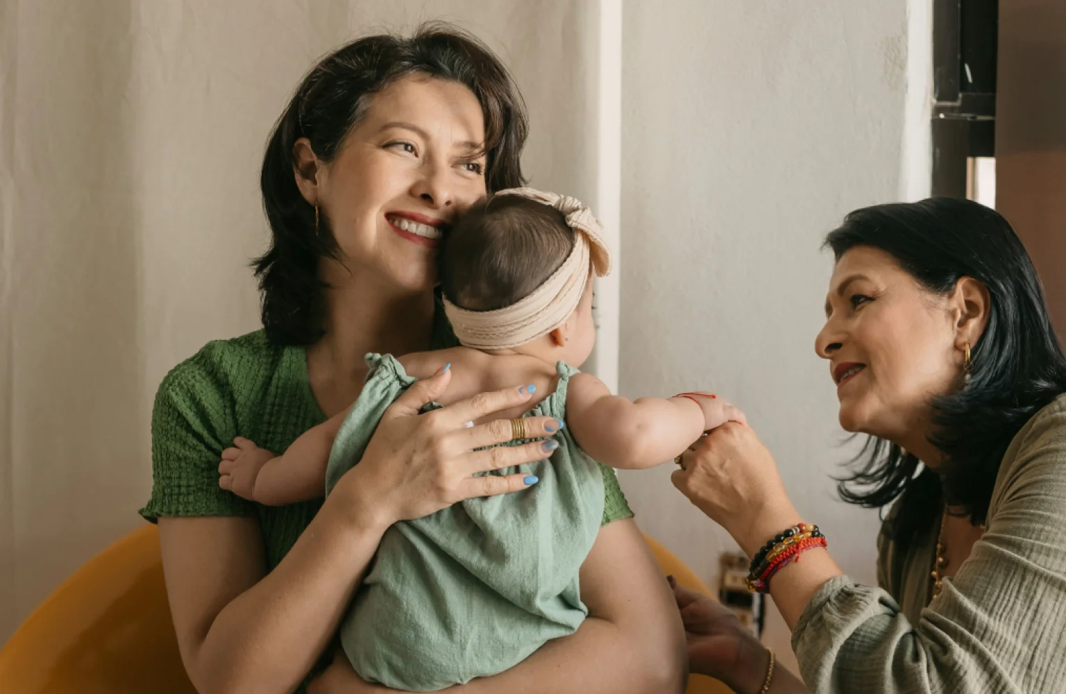 A grandmother, daughter and granddaughter relishes in the current moment together while planning for the future.