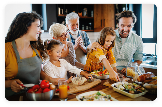 A joyful blended family enjoying time together, highlighting the importance of estate planning for blended families to ensure fair distribution of assets and protect the interests of all family members.