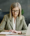 A LegalZoom attorney sitting at her desk in front of a laptop