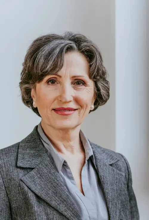 A headshot of a smiling female family law attorney who specializes in legal name change