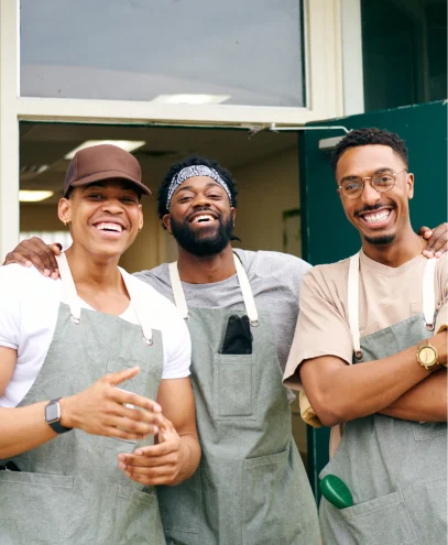 Three men finish up their job in the restaurant. 