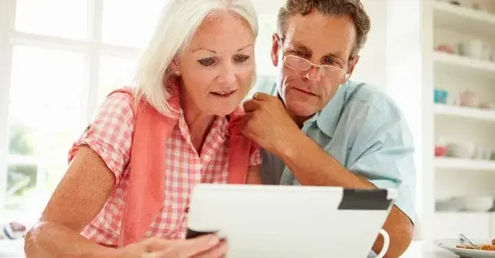 A couple checking their estate plan after they moved to a new state. 