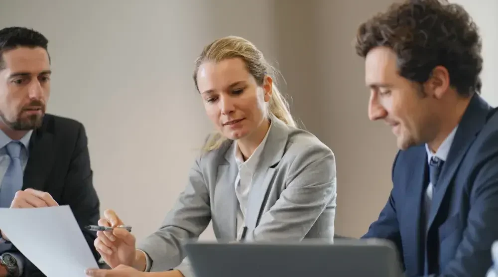 An attorney reviewing a contract with two clients