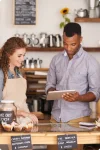 A male and a female barista who were hired as independent contractors to supplement workflow <a href=