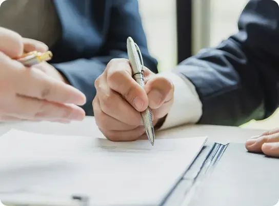 Corporate Supplies - Man holding a pen