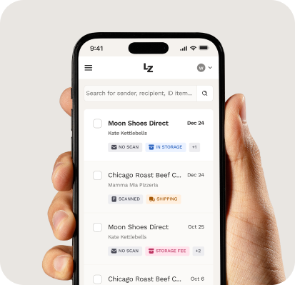 Hand holding smartphone with LZ virtual mail page displayed