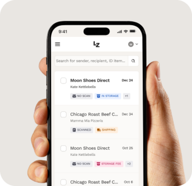 Hand holding smartphone with LZ virtual mail page displayed