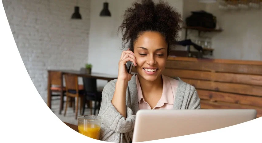 A woman engaged in a phone conversation with an attorney