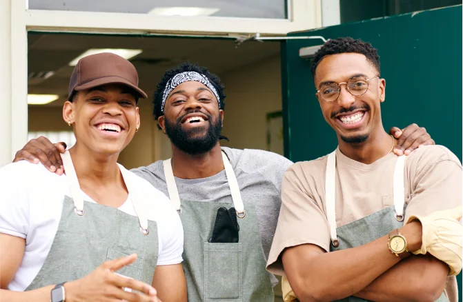 Three men finish up their job in the restaurant. 