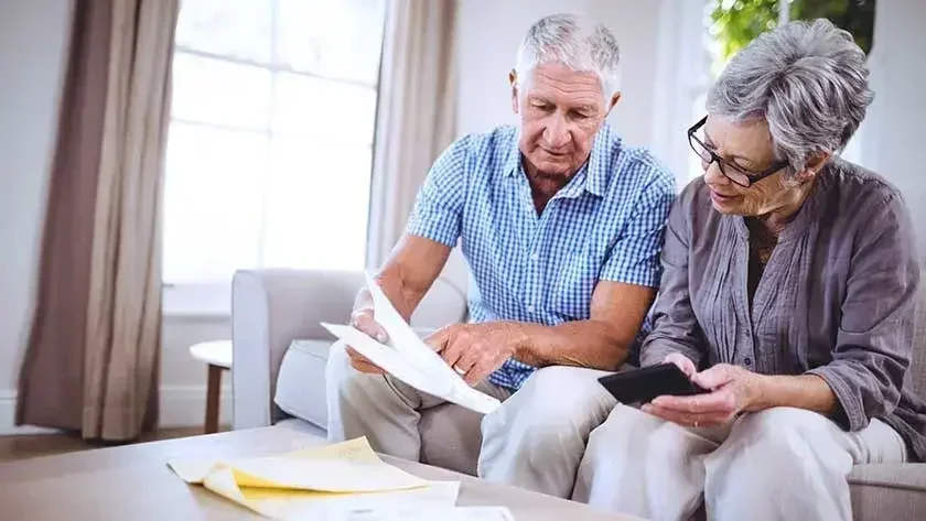 An elderly couple is discussing the differences between a trustee and an executor.