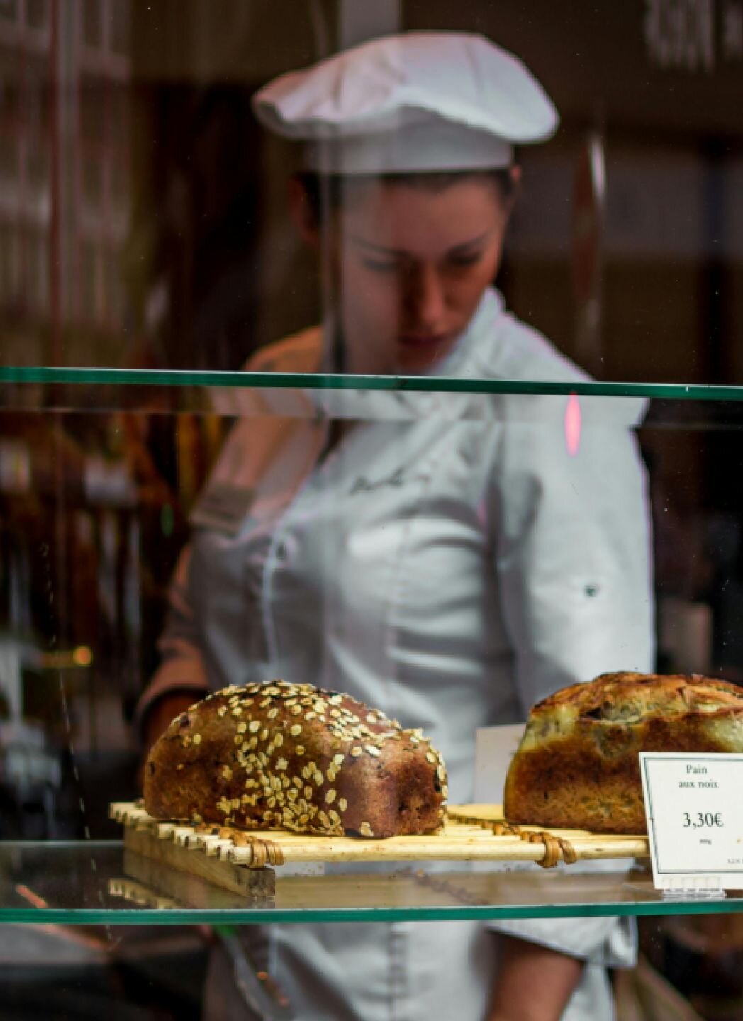 A baker works in a cafe