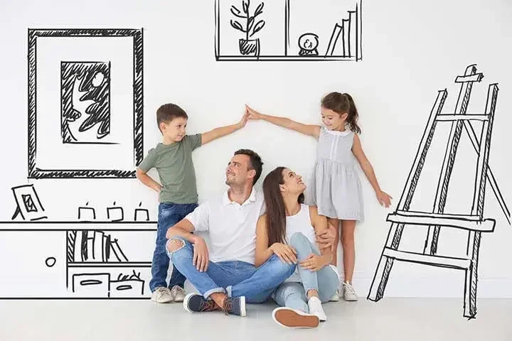 An image of parents and their kids smiling at each other in their home.