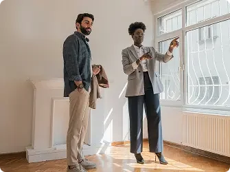 A man and women tour commercial real estate 