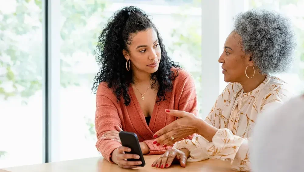 A daughter and mother discuss options for a last will and testament.