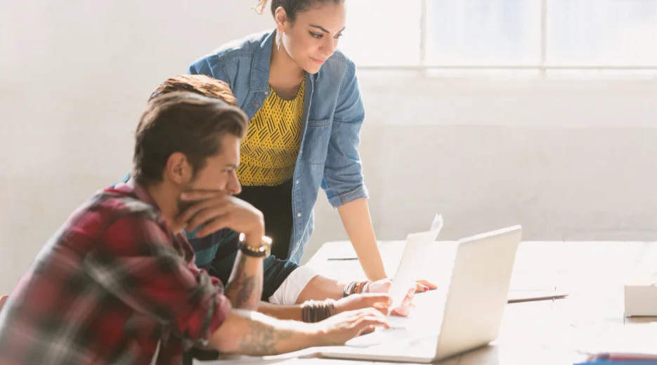 Man and woman research how to get a California business license