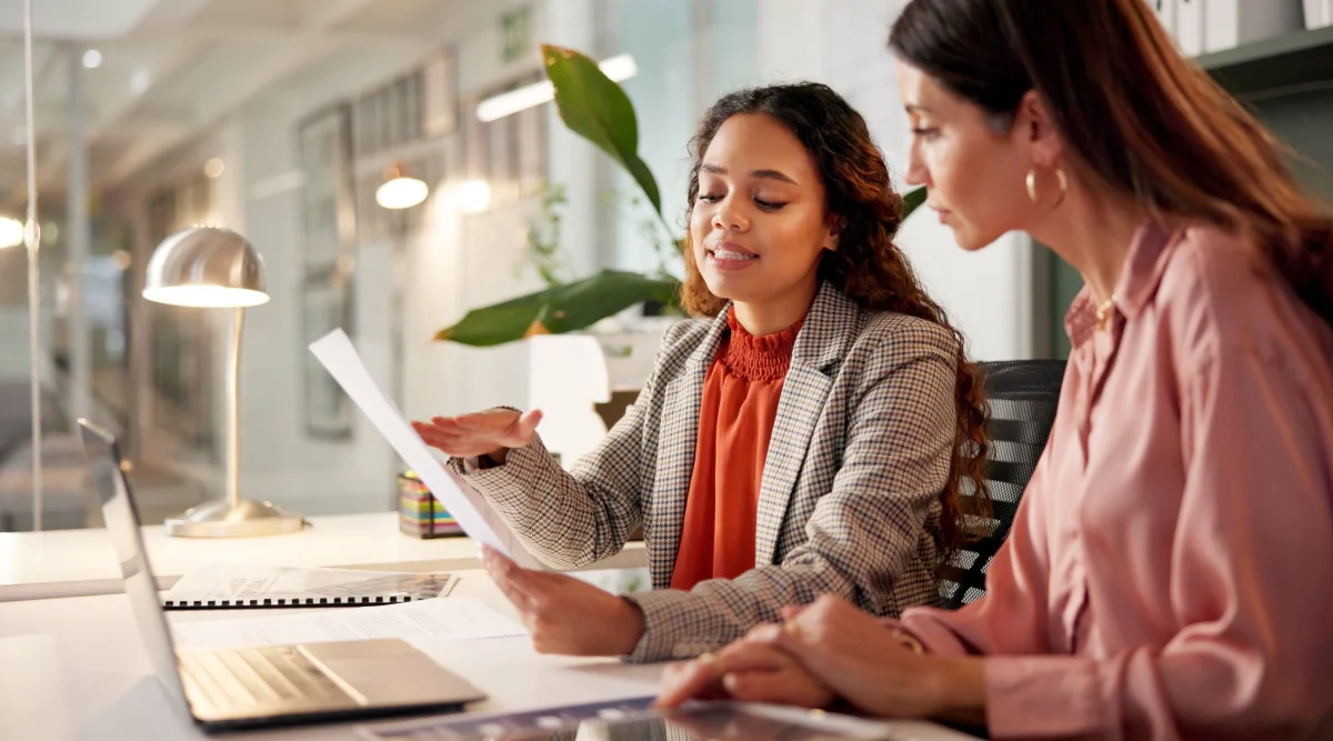 Female business partners look into getting a license in Oregon.