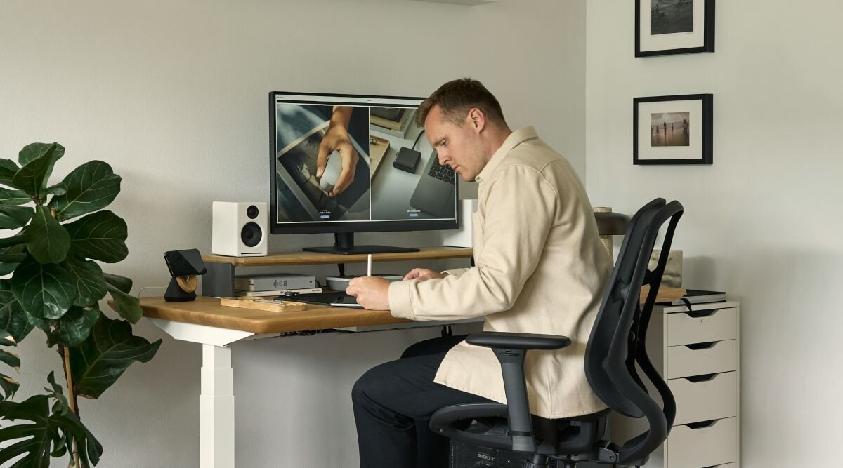 An inventor sits at his desk in his home office and makes some notes about his new product. While all inventions start with an idea, not every idea can be called an invention. 