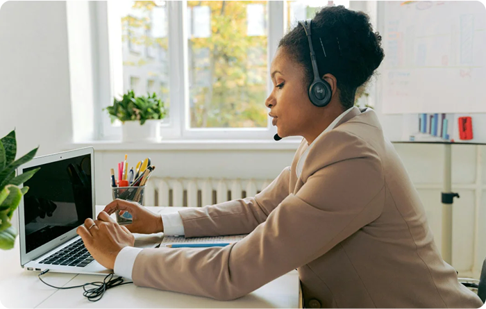 African American woman working at her desk