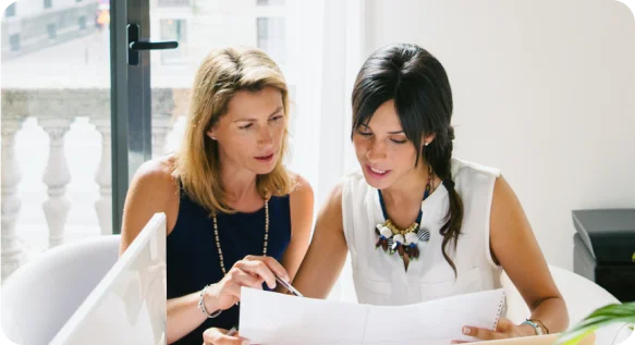 Two women discuss plans to create an LLC