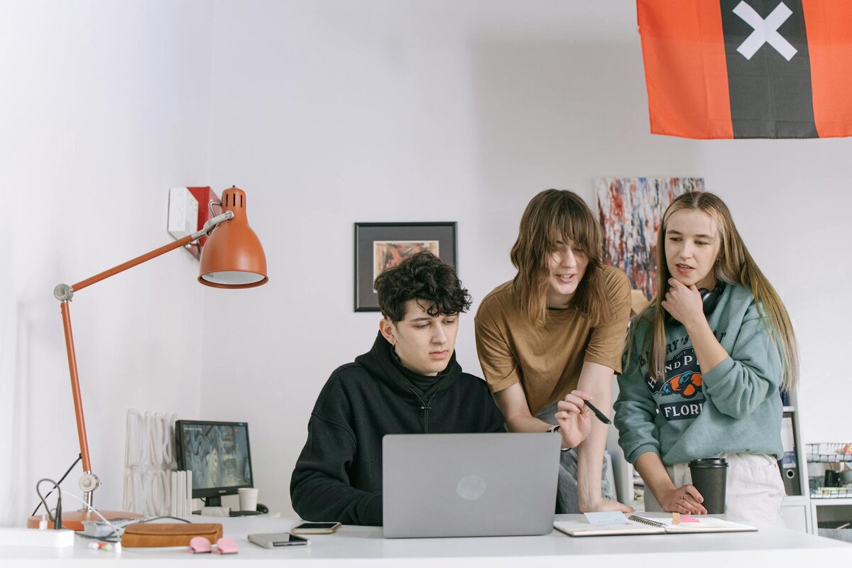 team gathering on work desk 