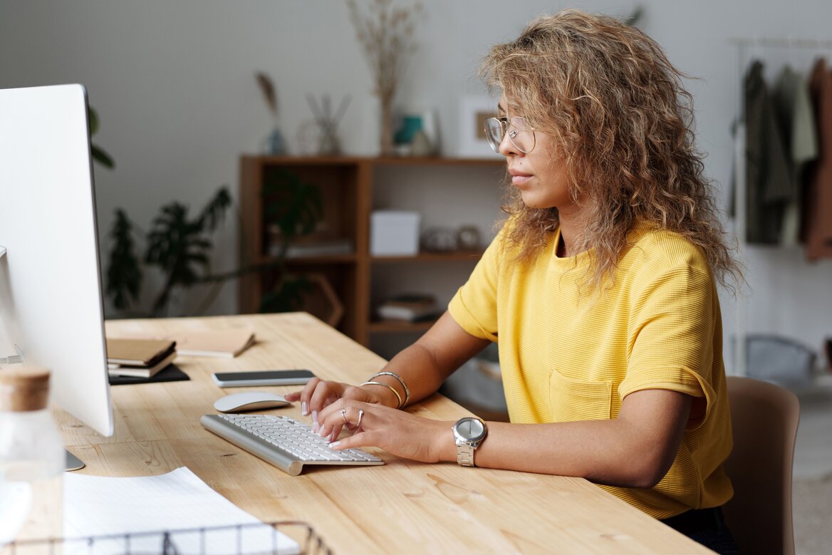 Self-employed woman checking her Laptop for HMRC digital letters