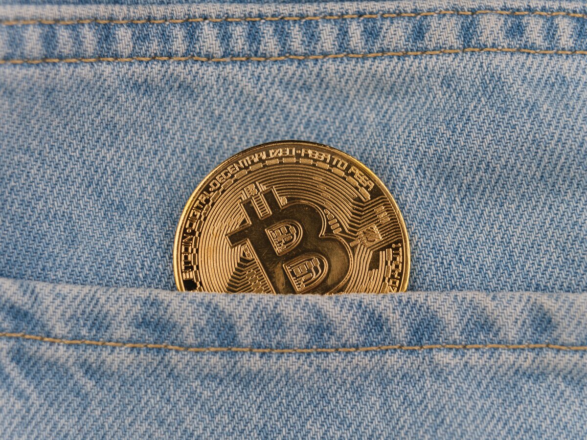 Crypto  bitcoin under a pile of dirt