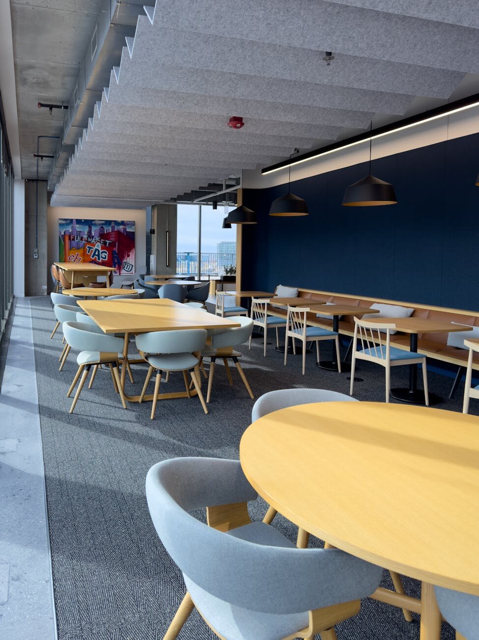 many chairs around a table in an office 