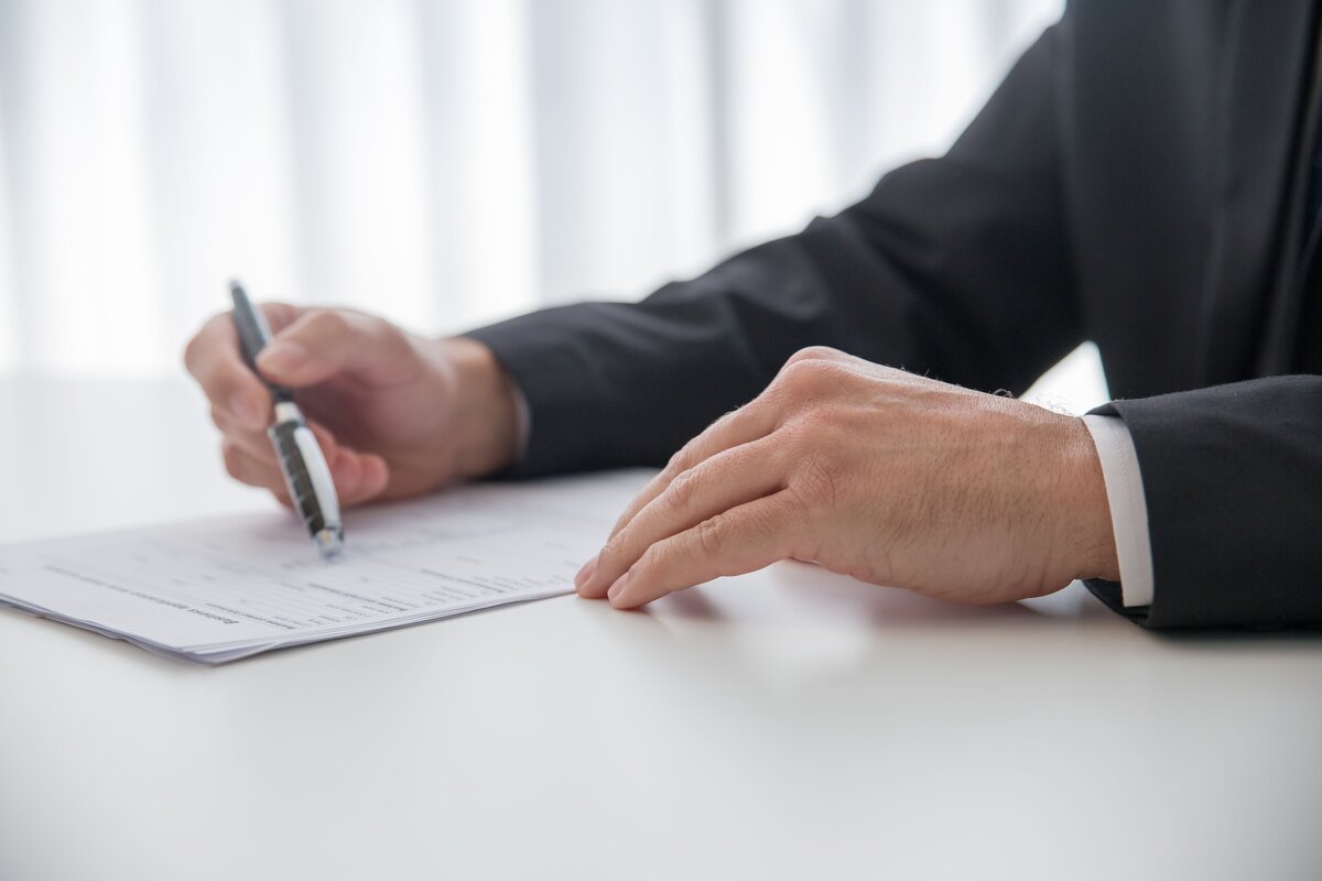 Solicitor signing property purchase documents