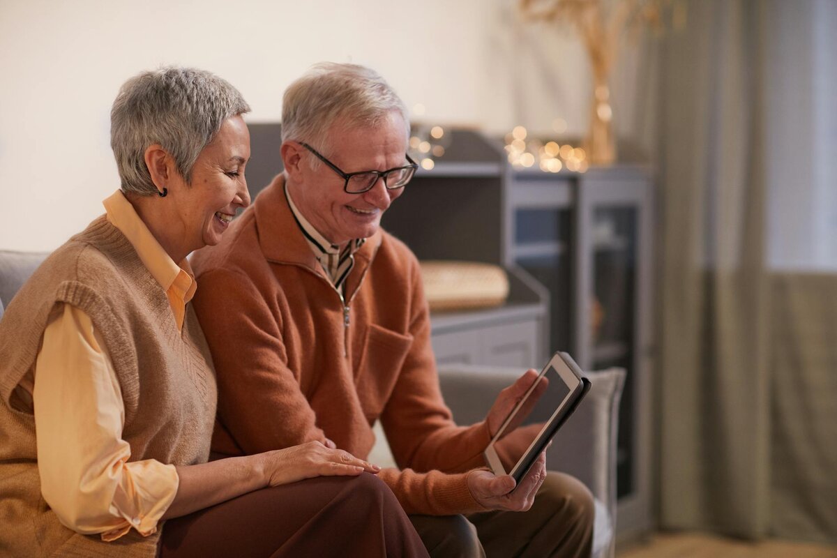 man and woman sitting together