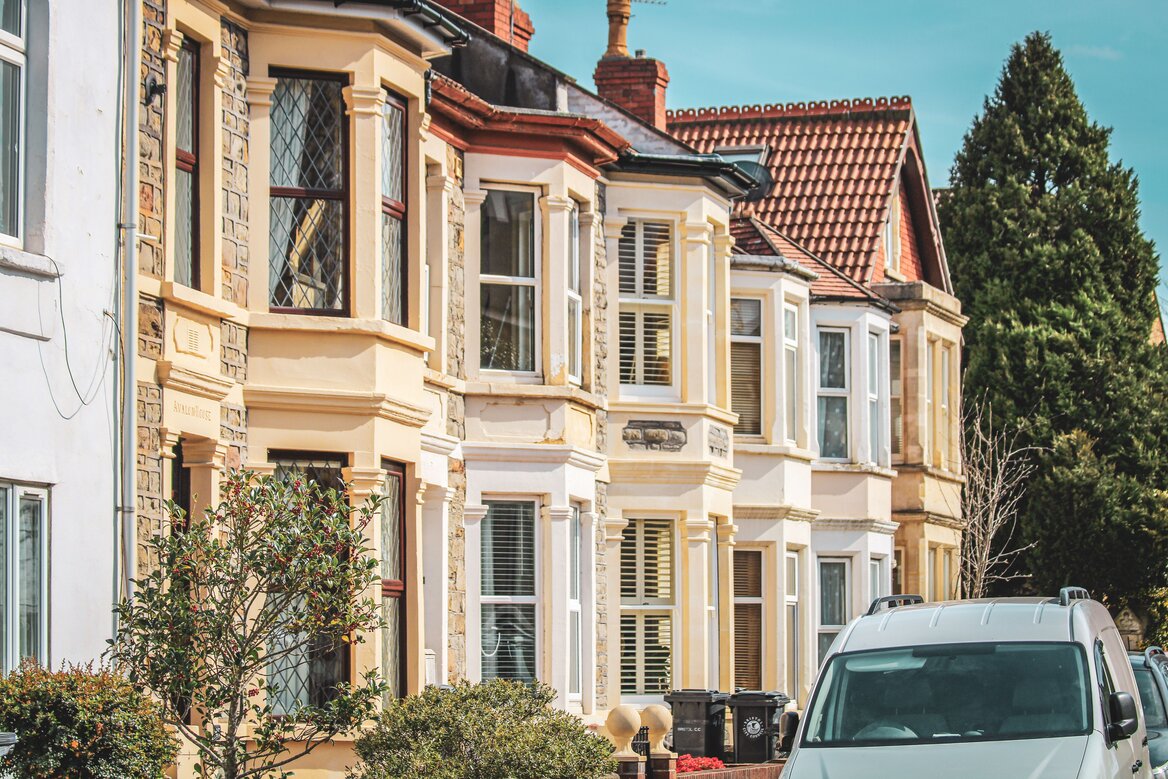A row of UK terraced houses representing buy-to-let rental properties for landlords filing Self Assessment tax returns