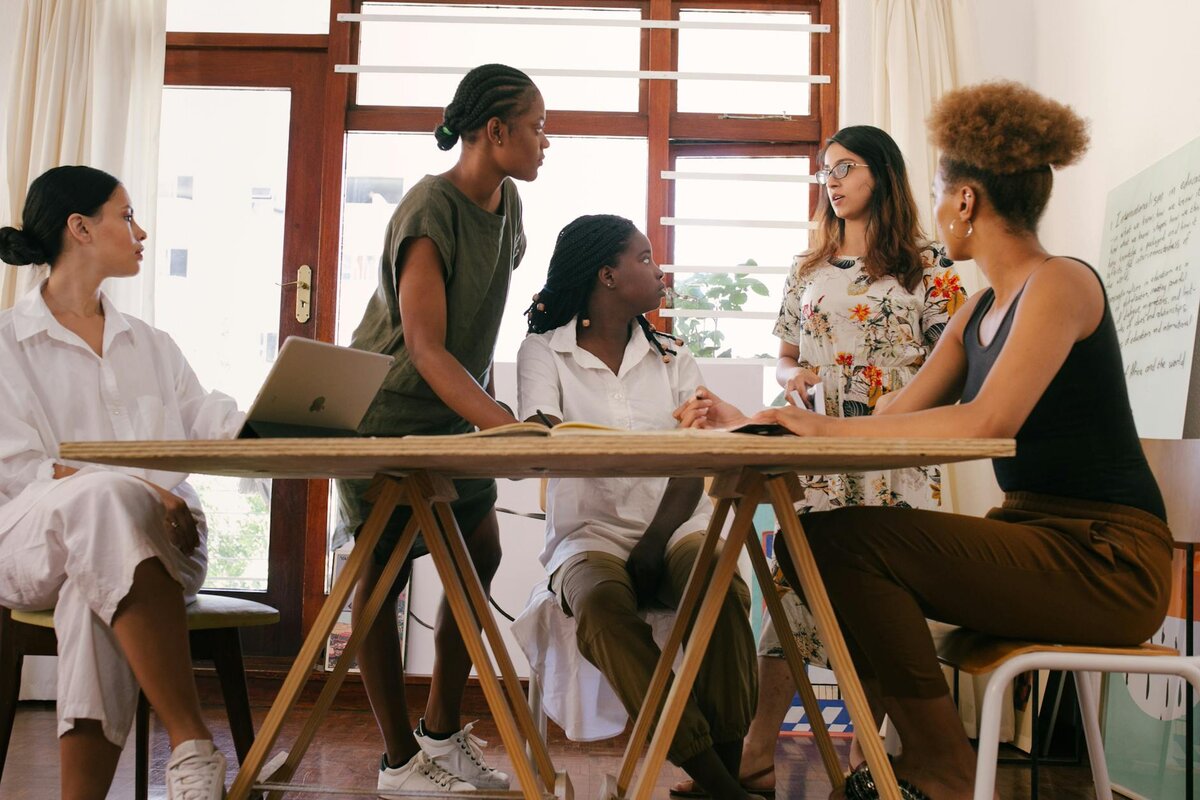 people sitting around table 