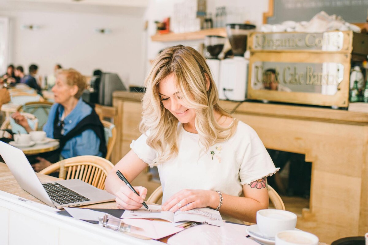 lady calculating at her desk