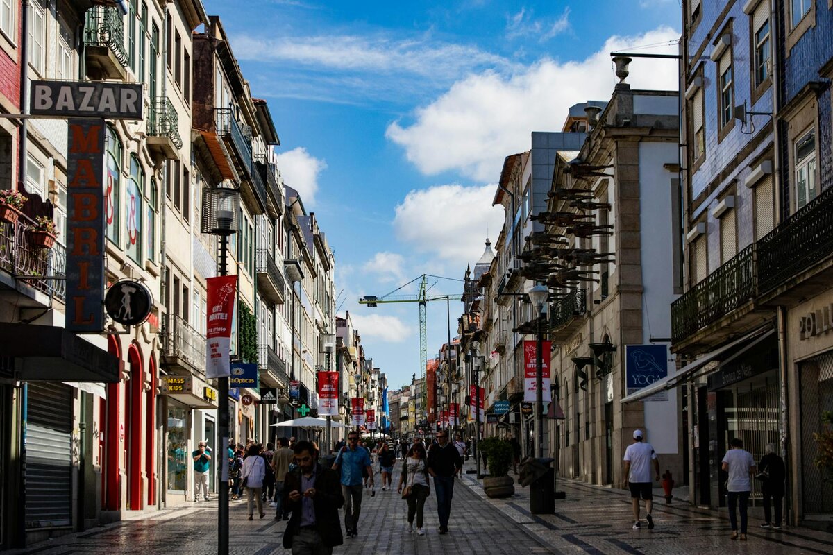 people walking down a street