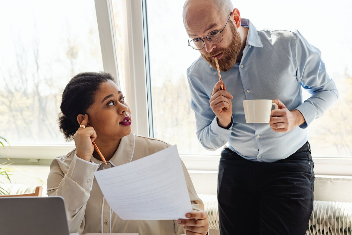 colleagues checking their personal savings allowance
