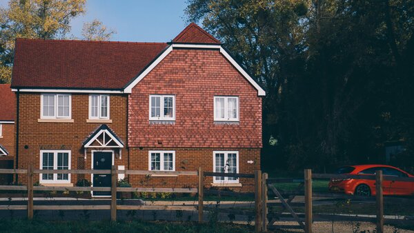 The upcoming property tax for high-value homes in England may incur significant implementation costs and stir debate over its impact.