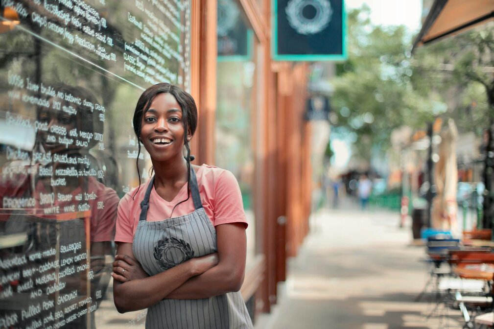 lady standing  Infront of store 