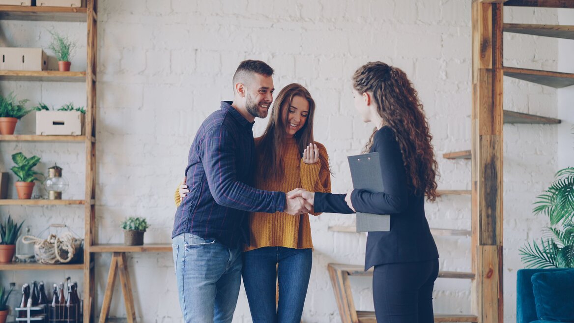 Landlords shaking hands with their accountant