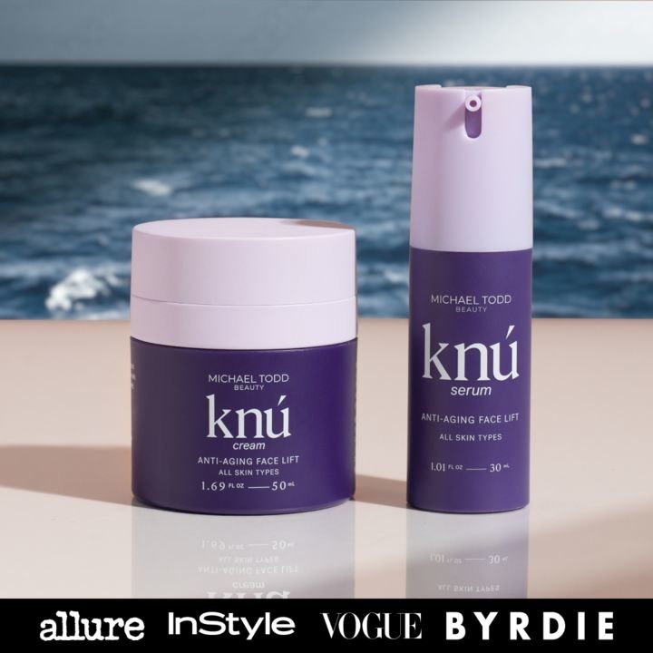 Two anti-aging skincare products by Michael Todd Beauty with the ocean in the background.