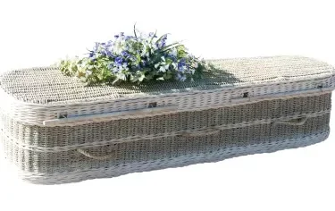 Seagrass coffin, affixed with flowers