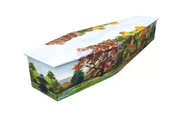 Coffin with autumnal imagery displayed