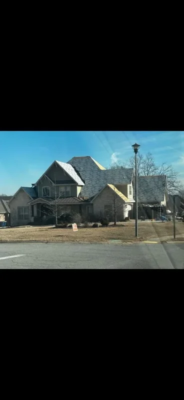 Completed multi-roof custom home exterior