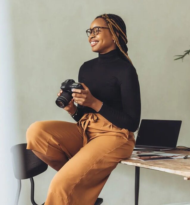 Short-term health insurance image of woman holding camera