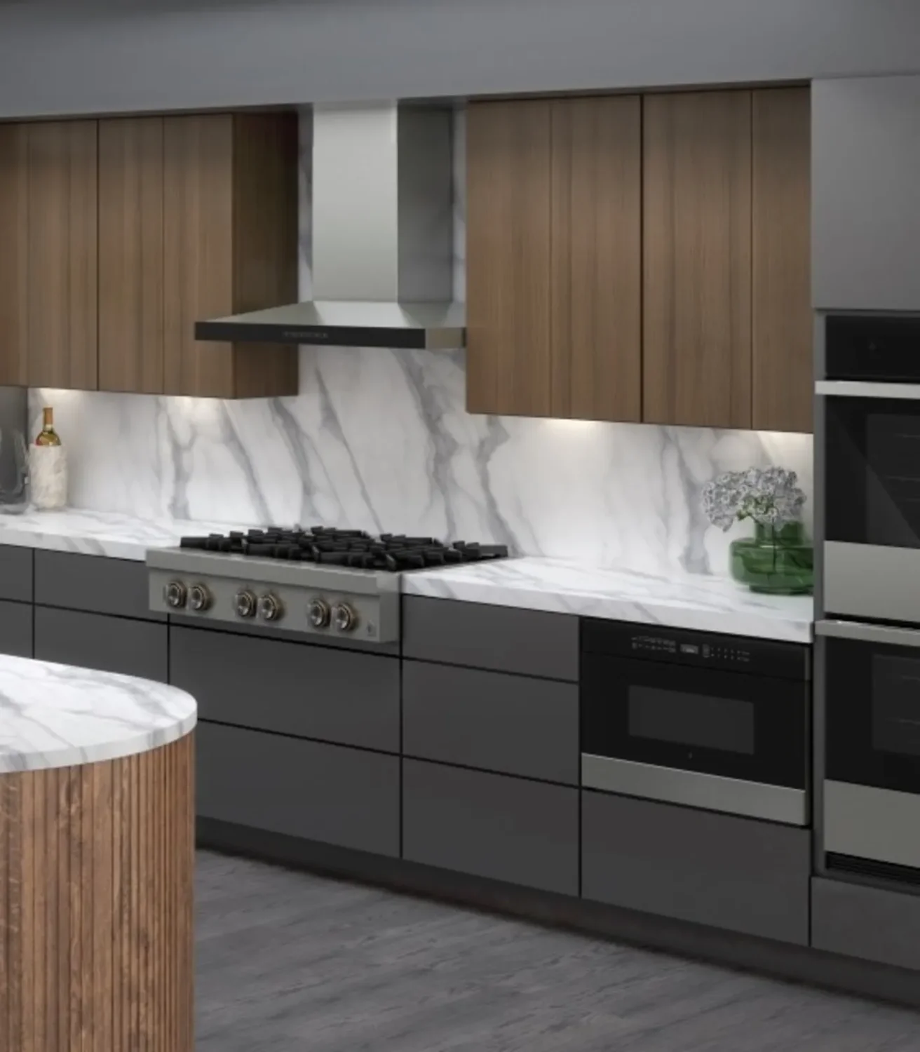 Image of a scene showing JennAir 36 inch Gas Rangetop and JennAir 1.2 cu.ft. Microwave Drawer and JennAir 36 inch 550 CFM Wall-Mount Hoodfan