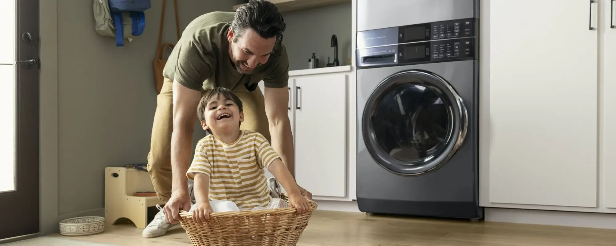 Image of a scene showing Electrolux Laundry Tower 5.2 cu.ft. Front Load Washer and 8 cu.ft. Electric Dryer Laundry Center